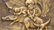 Tranh phù điêu em bé cưỡi trâu